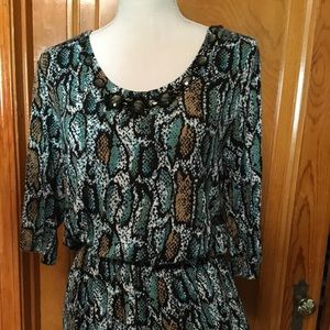 Gorgeous multicolored top with decorative neckline